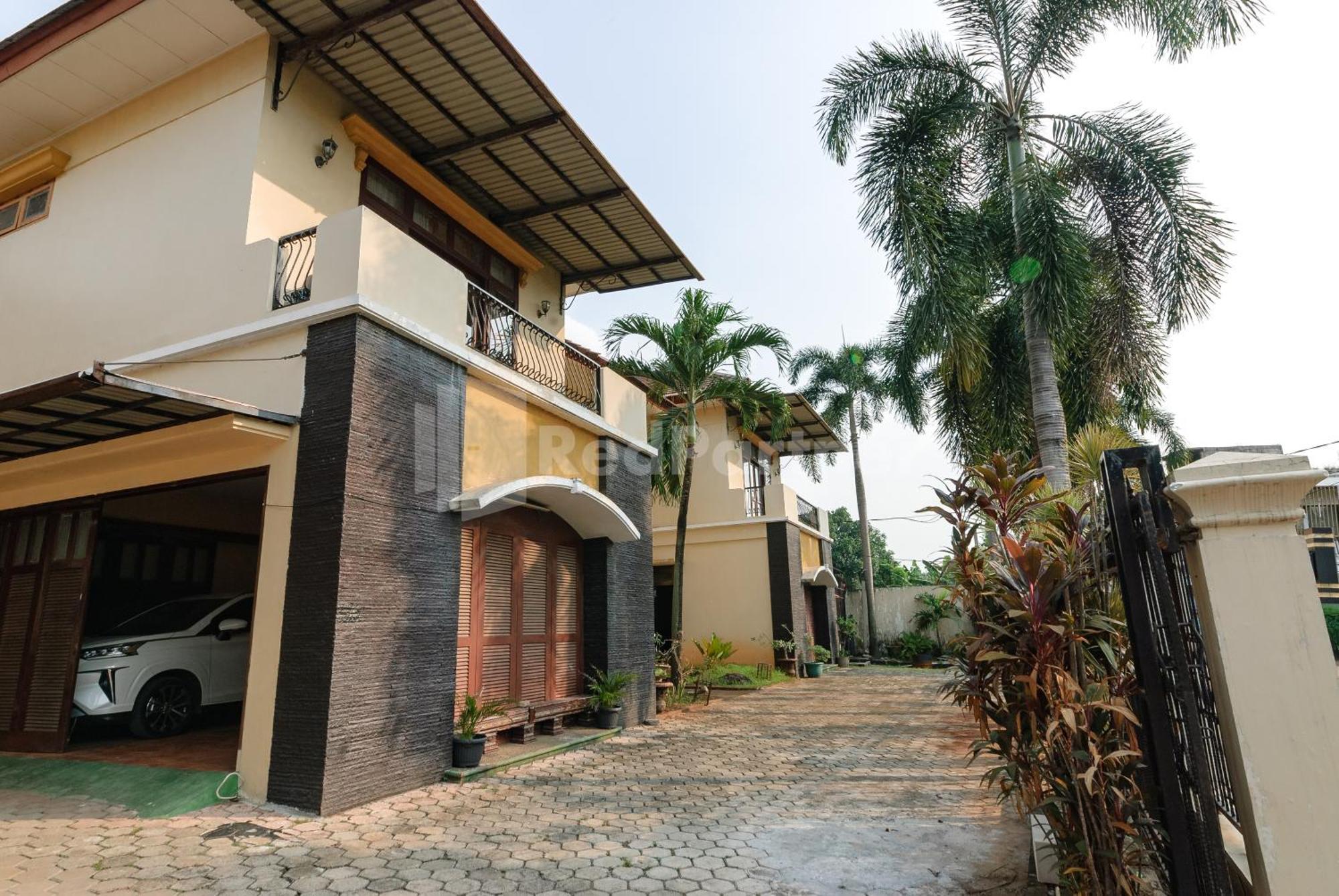 Sr Residence Near Mall Ciputra Cibubur Mitra Reddoorz Bekasi Exterior photo